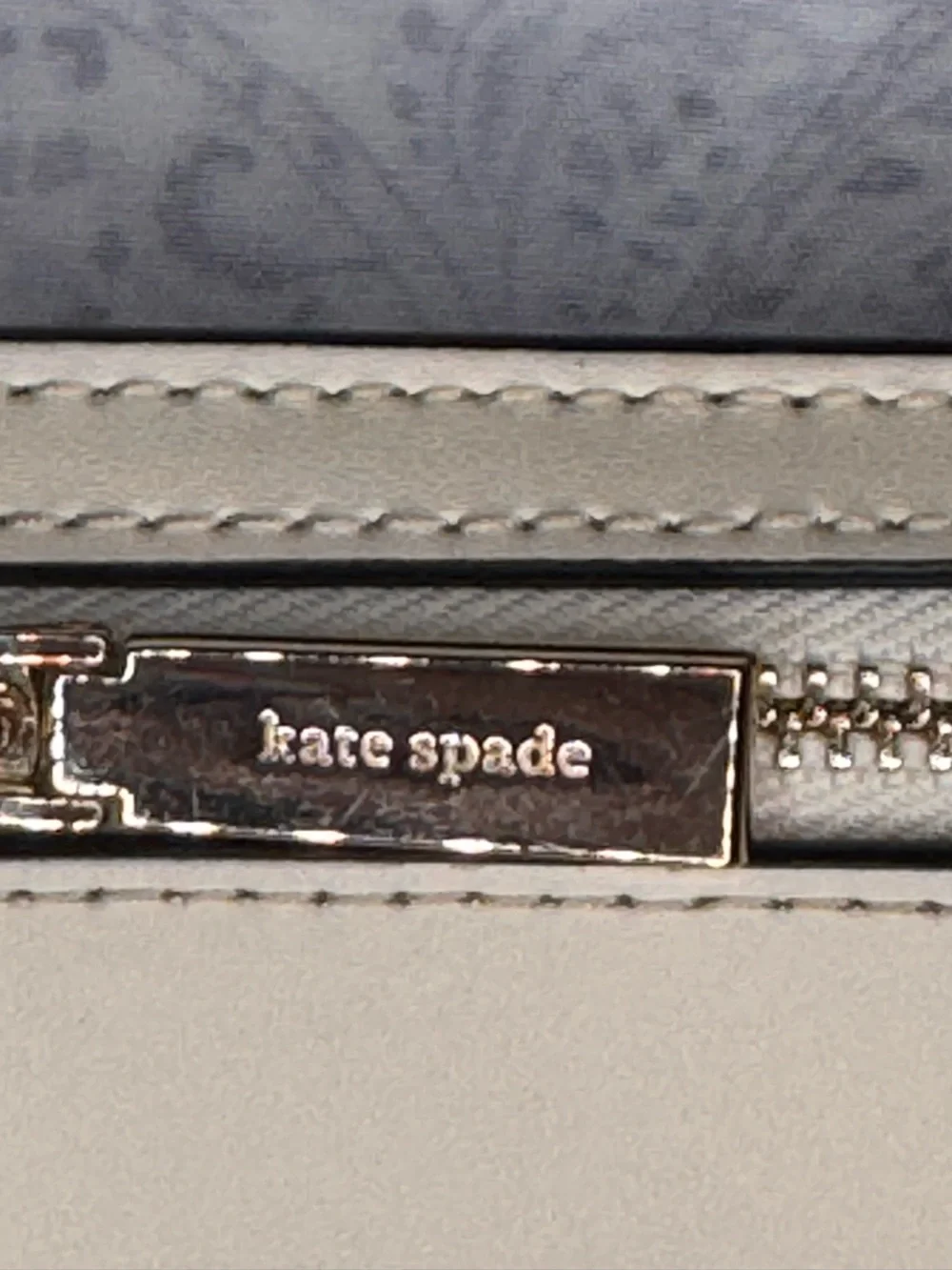 kate spade cream zip